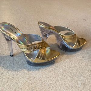 Gold heels. Any offer accepted